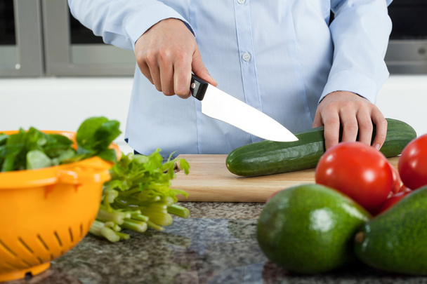 Cutting cucumber - Photo, Image