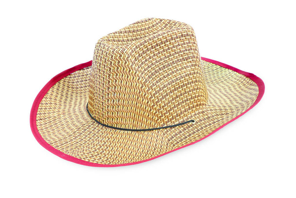 Sombrero de paja marrón aislado sobre fondo blanco - Foto, imagen