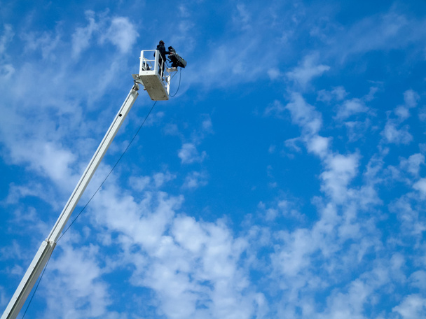 Cameraman filming on a crane - Foto, immagini