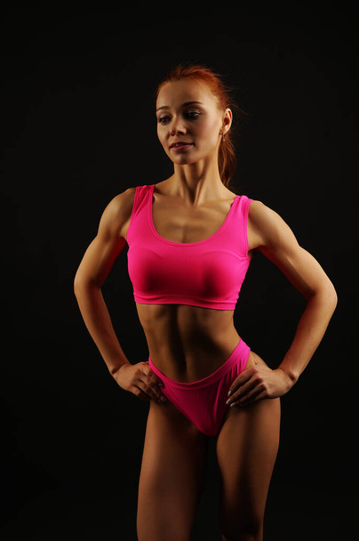 Female in studio, beautiful fitness sport woman's body is in an underwear - Zdjęcie, obraz