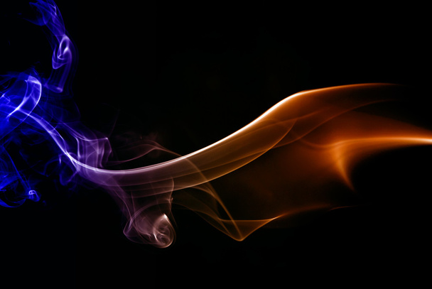 Абстрактний кольоровий дим на чорному тлі
 - Фото, зображення