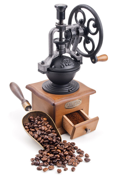 retro coffee grinder with scoop of roasted coffee beans - Fotó, kép