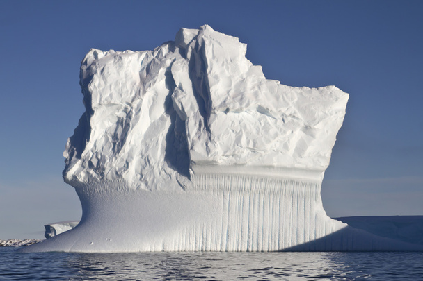 rectangular iceberg sunny summer day in Antarctic waters - Photo, Image