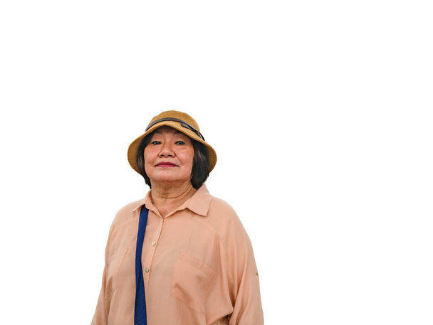 Senior Asian women Traveler wear a Hat on isolated backgroun - Photo, Image