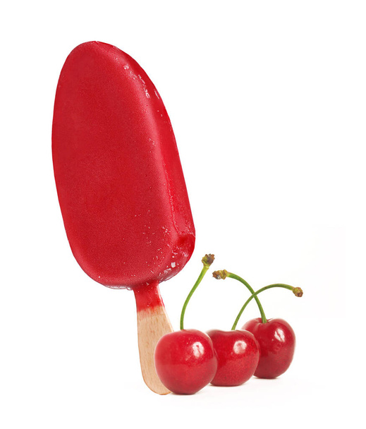 Cherry popcicle stick ice cream and cerries fruits on white background. - Фото, зображення