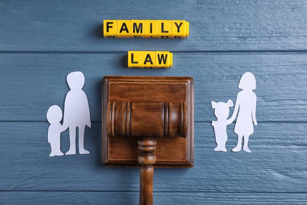 Family law concept. Flat lay composition with judge gavel on blue wooden background - Fotoğraf, Görsel