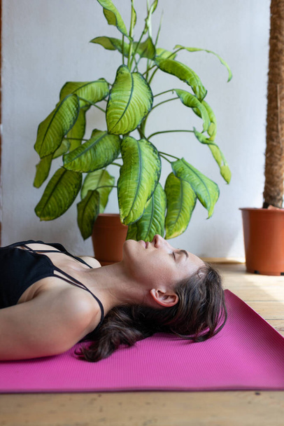 healthy and beautiful body concept.girl resting after yoga class - Photo, Image