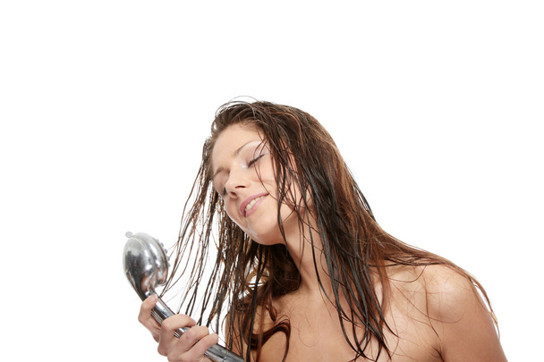 Young woman singing under shower - Foto, Bild