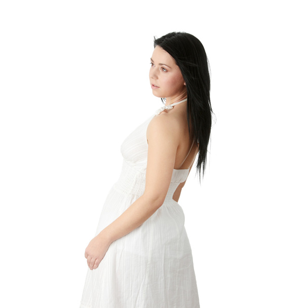 Corpulent caucasian female in elegant white dress, isolated on white background - Foto, Imagen