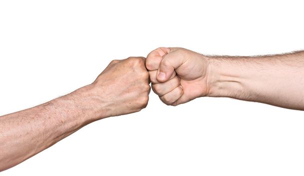 два чоловіки підстрибують кулаки
 - Фото, зображення