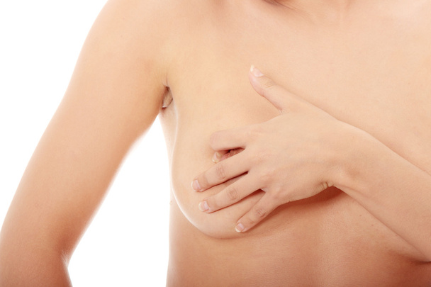 Woman examining her breast - Foto, immagini