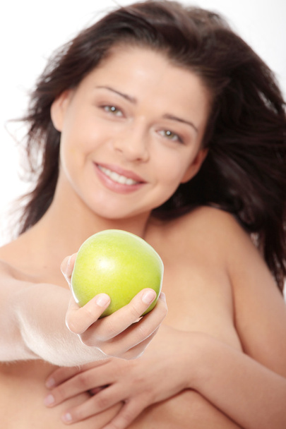 Beautiful topless girl with green apple, isolated on white background - Foto, Imagen