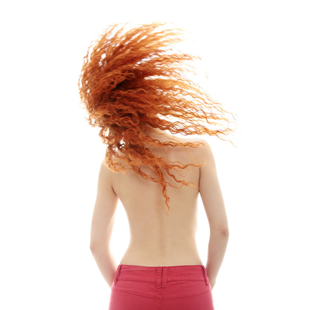 Rear view of the young female with beauty curly long hairs - on a white - Foto, Imagem