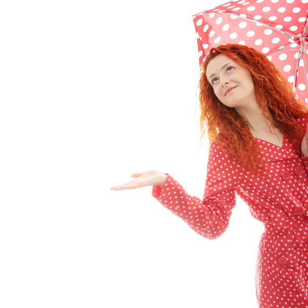Rainy woman in red, isolated on white background - 写真・画像