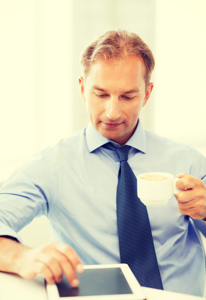 businessman with tablet pc and coffee in office - Zdjęcie, obraz