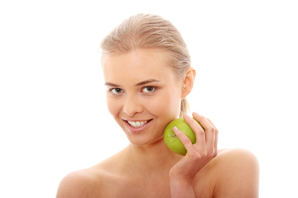 Beautiful girl eating green apple - Foto, Imagen