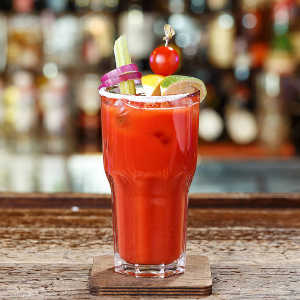 Bloody Mary garnish garnished with vegetables, with Tabasco, vodka and tomato juice. Space for recipe - Foto, afbeelding