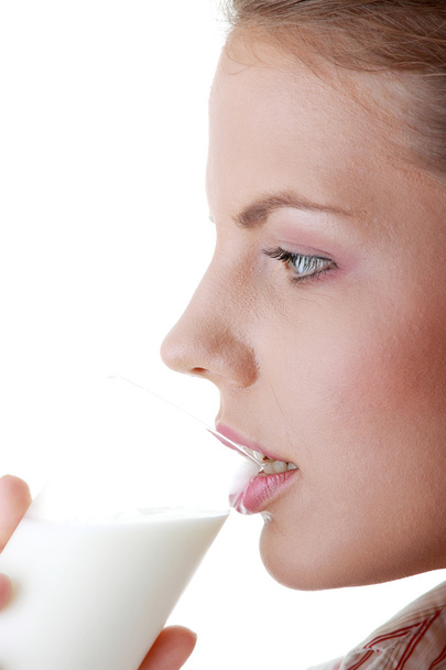 Young happy woman drinking milk - Foto, Imagem