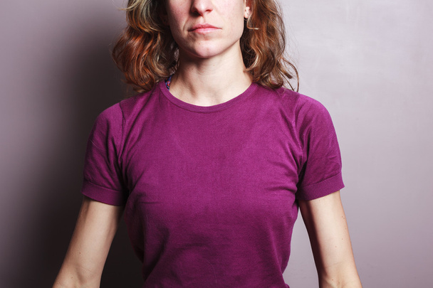 Young woman in purple top - Zdjęcie, obraz