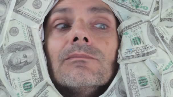 Man under dollar notes - Footage, Video