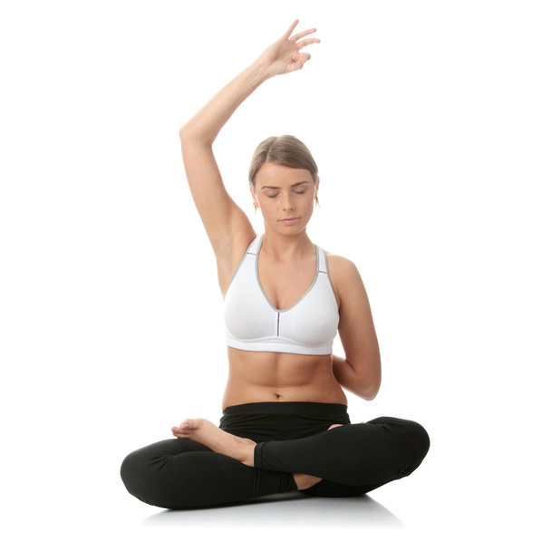 Beautiful young woman doing yoga exercise , isolated - Zdjęcie, obraz