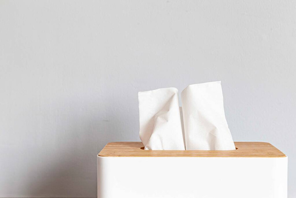 Square white wooden box for tissue paper towels - 写真・画像
