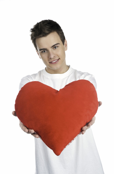 Cute young menl with a red heart - Photo, Image