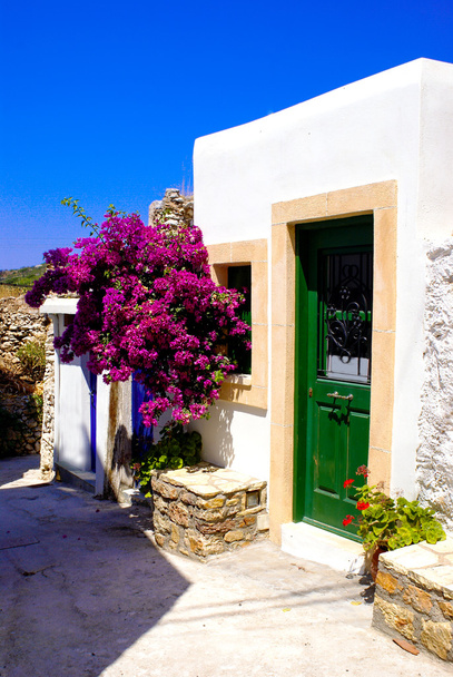 Greek traditional house located at Santorini island - Photo, Image