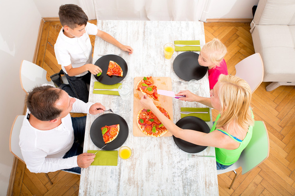 Family eating Pizza	 - Photo, Image