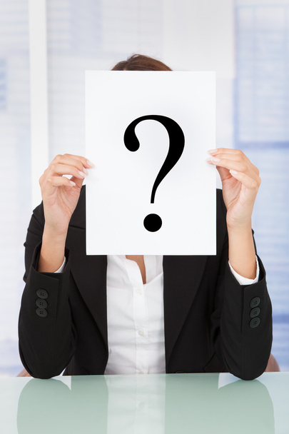 Businesswoman Holding Paper With Question Mark - Photo, Image