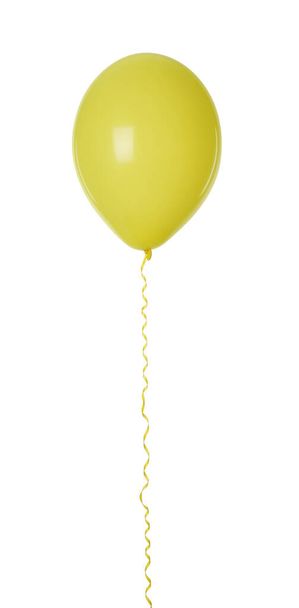 Yellow balloon with ribbon isolated on white - Zdjęcie, obraz