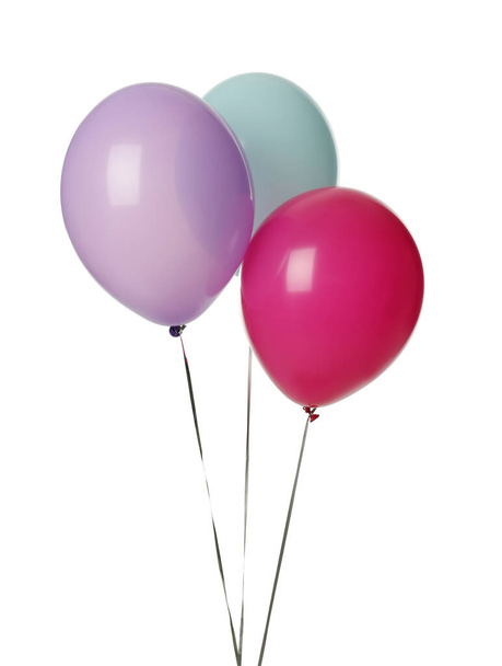 Colorful balloons with ribbons on white background - Foto, immagini