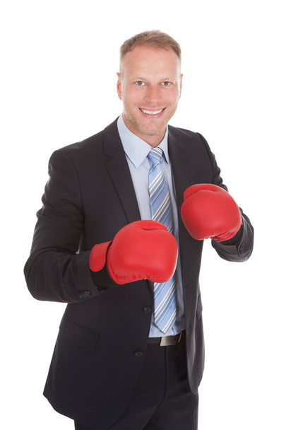 Businessman Wearing Boxing Gloves - Valokuva, kuva