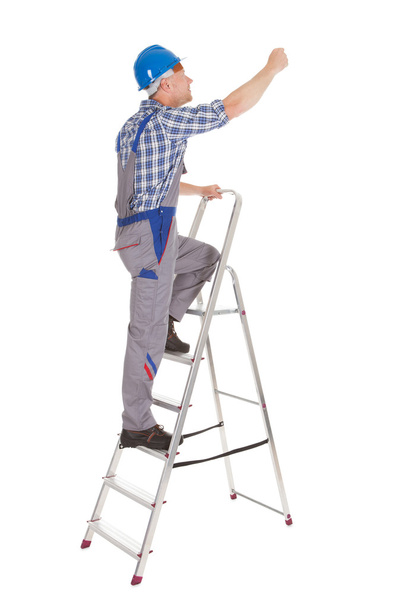 Repairman Climbing Step Ladder - Foto, Imagem