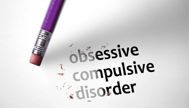 Eraser deleting the concept Obsessive Compulsive Disorder, OCD.  - Photo, Image