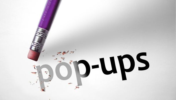 Eraser deleting the word Pop-ups - Photo, Image