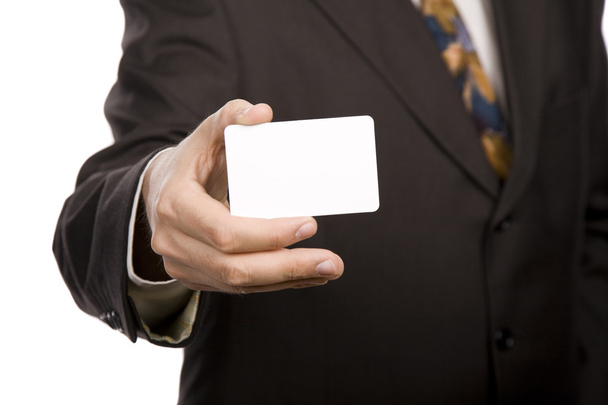 Hand of businessman offering businesscard on white background - Foto, imagen