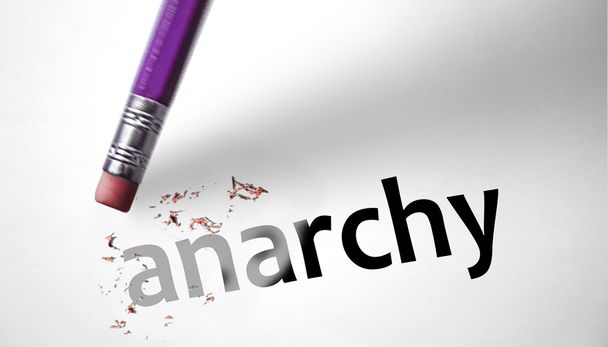 Eraser deleting the word Anarchy  - Photo, Image