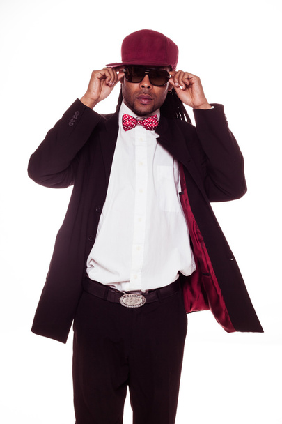 jamaican man wearing suit and sunglasses and bow - Foto, imagen