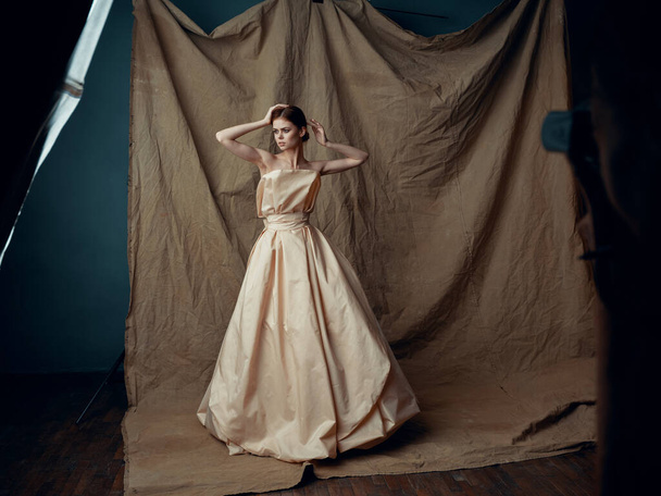 beautiful woman in dress photoshoot posing studio - Фото, изображение