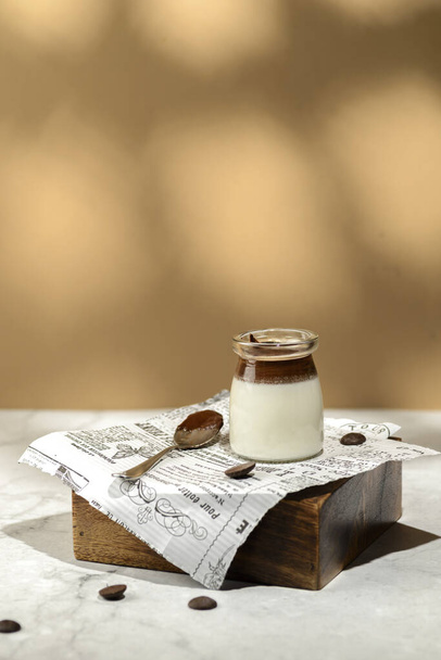 panna cotta with chocolate in a jar. High quality photo - 写真・画像