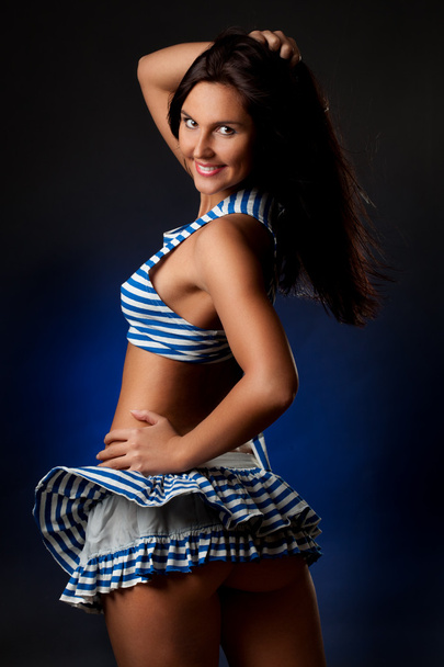 Sexy woman wearing striped costume - Foto, afbeelding