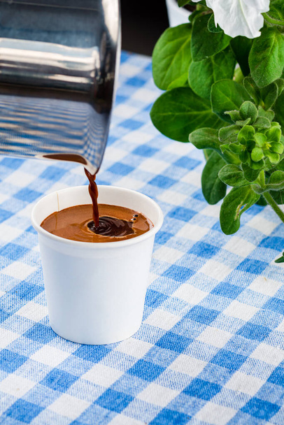 Takeaway blank small turkish coffee cup, espresso coffee in a paper cup takeaway, coffee from turk. Delivery concept. Eco packages concept - Φωτογραφία, εικόνα