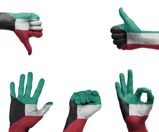 hand instellen met de vlag van Koeweit - Foto, afbeelding