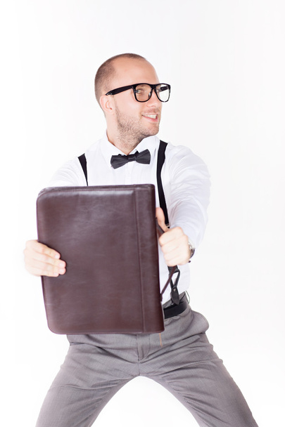 Young businessman holding a briefcase - Photo, Image