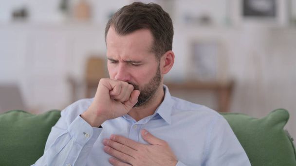 Sick Young Man Coughing at Home  - Photo, Image