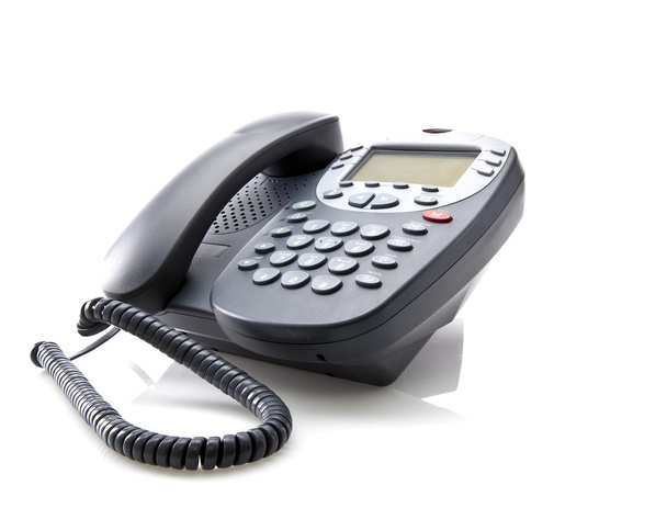 Telefone cinzento do escritório isolado em um fundo branco
 - Foto, Imagem