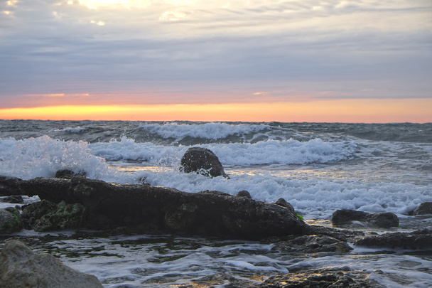 Sunset on a sea beach - Fotografie, Obrázek