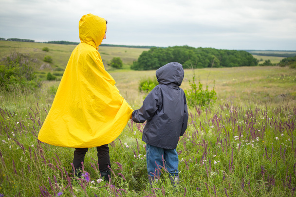 Family walking hiking on a rainy day - Fotografie, Obrázek