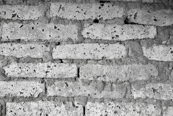 Bricks wall made of mud in village house textured wall effect and sticked with mud. - Photo, Image